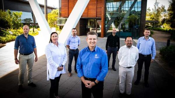 SBRC Team standing outside the SBRC Building
