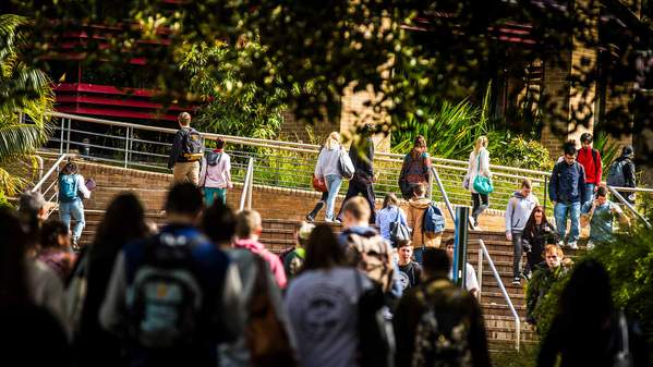 Campus generic. Students walking Main Campus near Bldg 67.