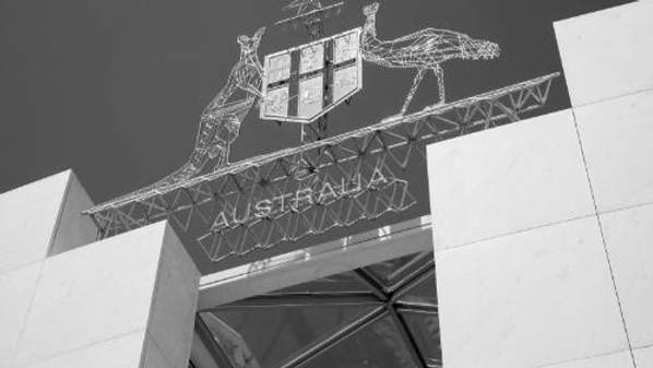 A black and white picture of the Australian coat of arms