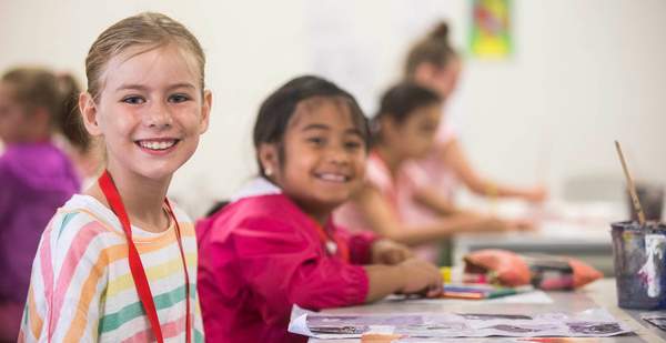 Two young girls take part in UOW's Learning Labs. Photo: Paul Jones