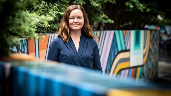 Professor Lisa Kervin stands outside the colourful walls of Early Start. Photo: Paul Jones