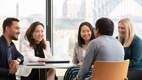 Students working together at the Sydney Business School, University of Wollongong, on UOW's Sydney campus.