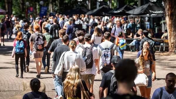 A crowd scene of students on the 51 campus heading to classes.