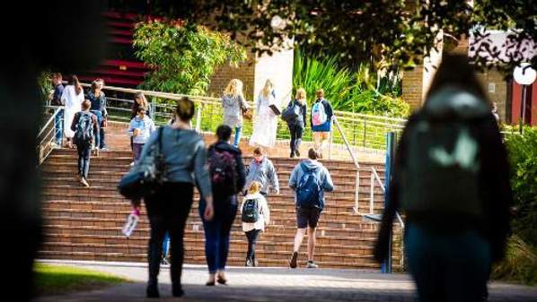 Students walking between classes on the UOW 51 Campus