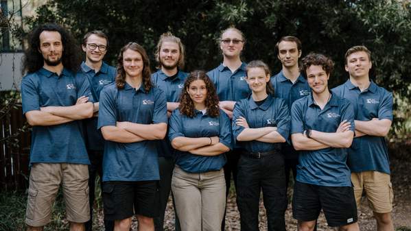 Students from UOW Rover team standing in a group smiling with their arms crossed. Photo: Michael Gray