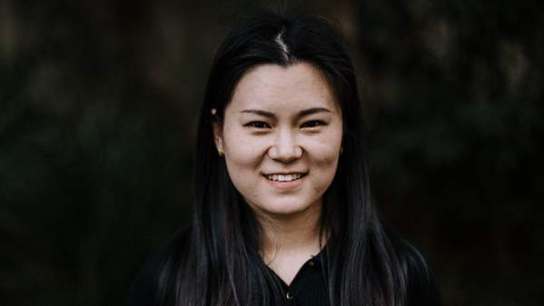 UOW PhD candiate Yunjia Lei looks straight at the camera. She has dark hair and is wearing a black shirt. Photo: Michael Grey