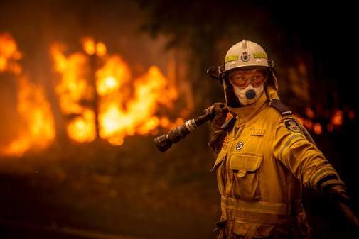 A female firefighter in gear