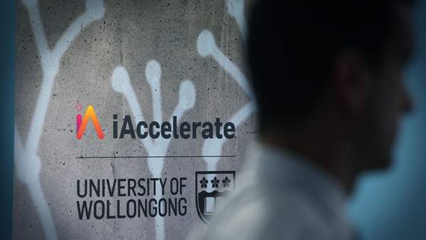 Logo of iAccelerate next to the logo of UOW