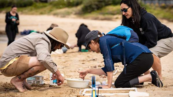 Students at microplastics sampling event