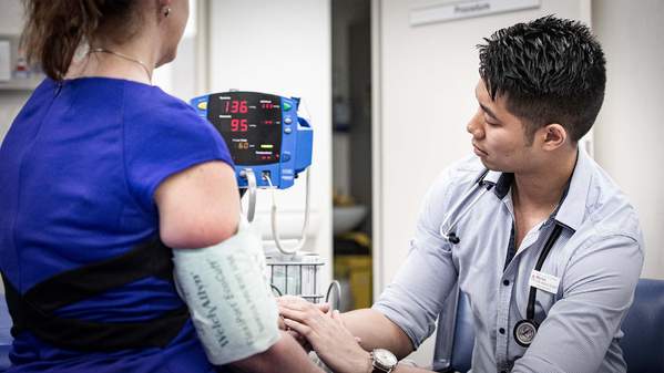 Rural medicine student Billy Tran with his patient