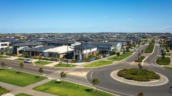 Aerial view of a new Australian suburb with lots of big houses.