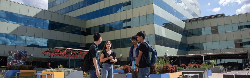 Students on rooftop at the SWS campus