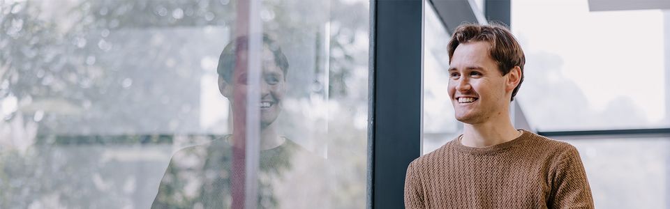 Student looking out window
