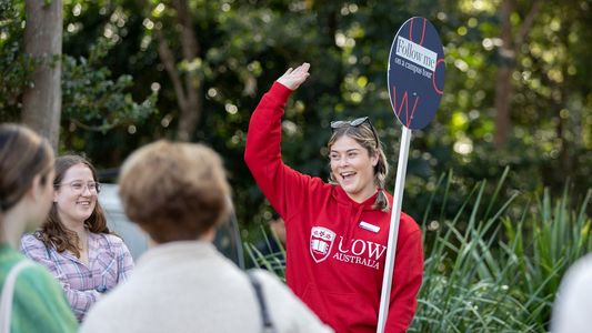 a student representative running a campus tour at Open Day 2022