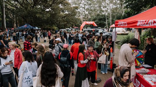 Students walking around the Orientation stalls