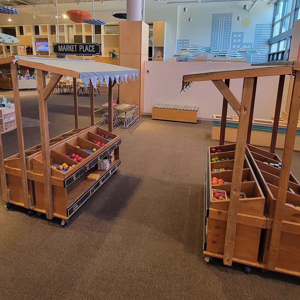 Marketplace shows some stalls with role play food and grocery items