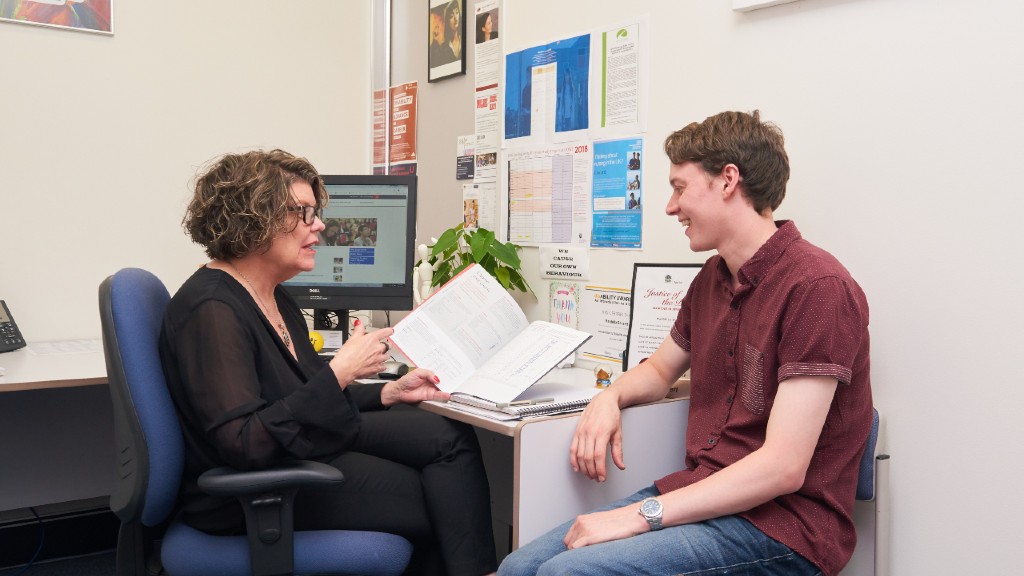 STudent chatting to support coordinator