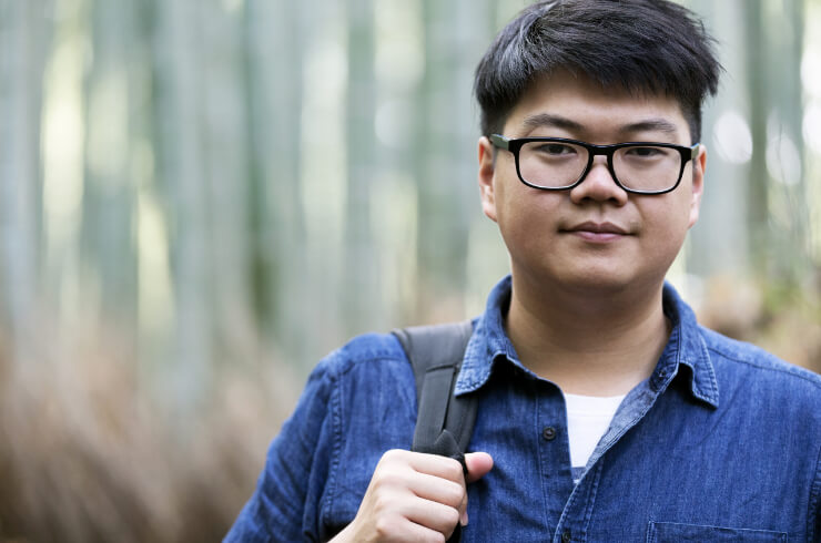 A student with a backpack