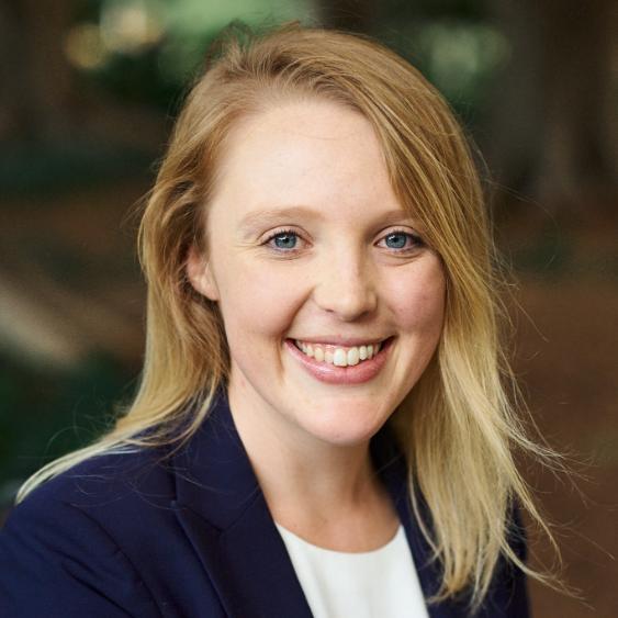 UOW graduate Melanie O'Brien smiling at camera