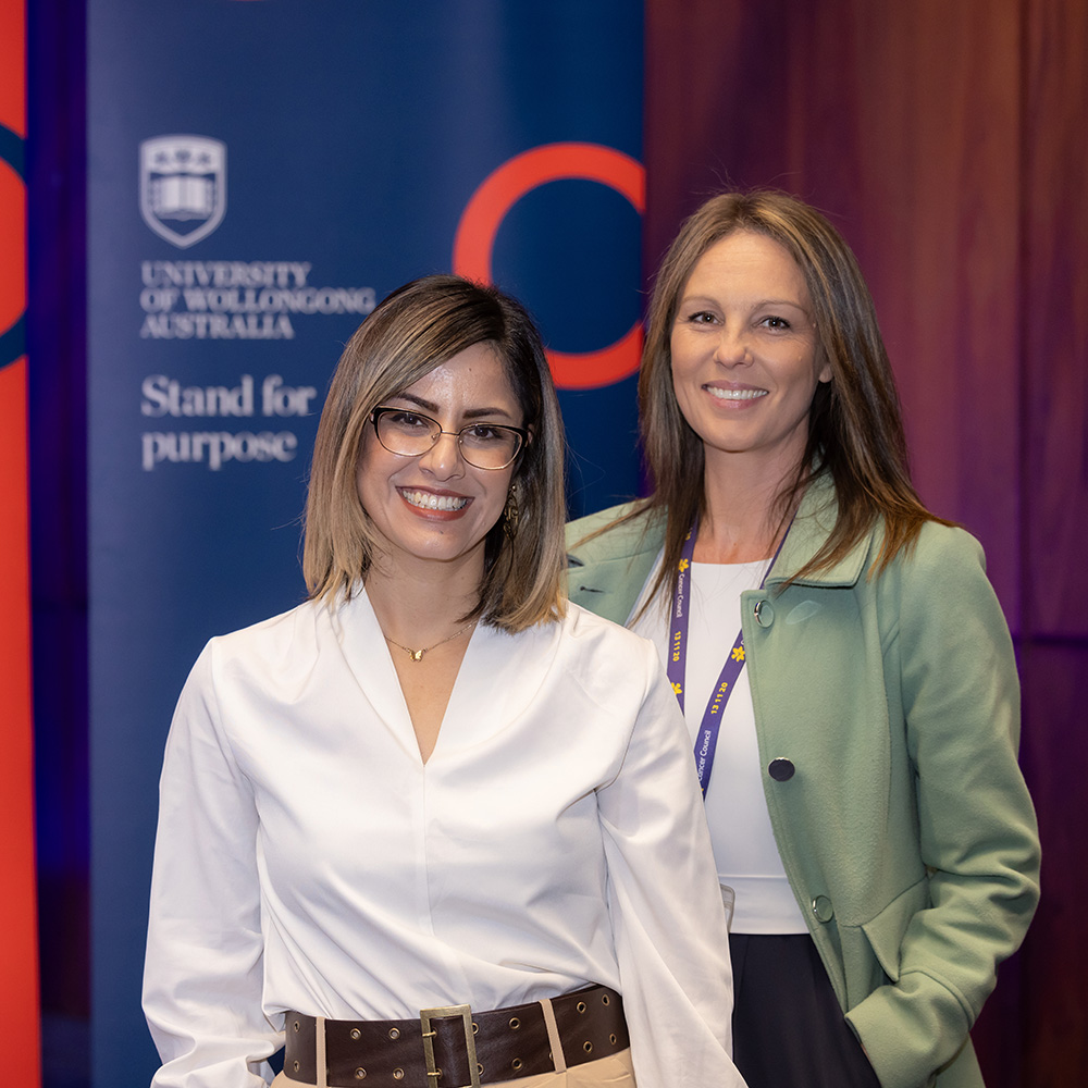 Portrait of Associate Professor Kara Vine-Perrow and Dr Elaine Miesel together at a university event.
