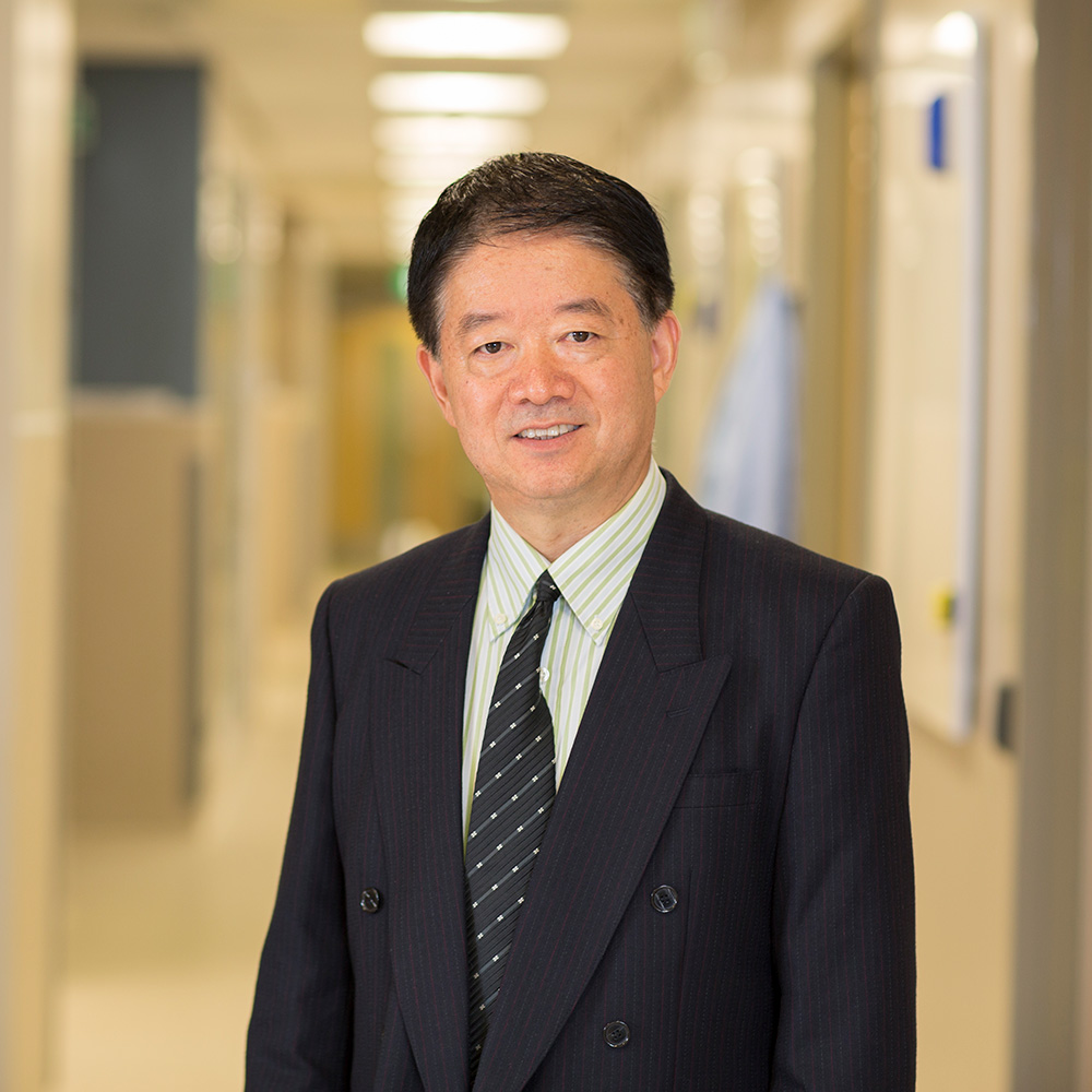 Portrait of Distinguished Professor Xu-Feng Huang.