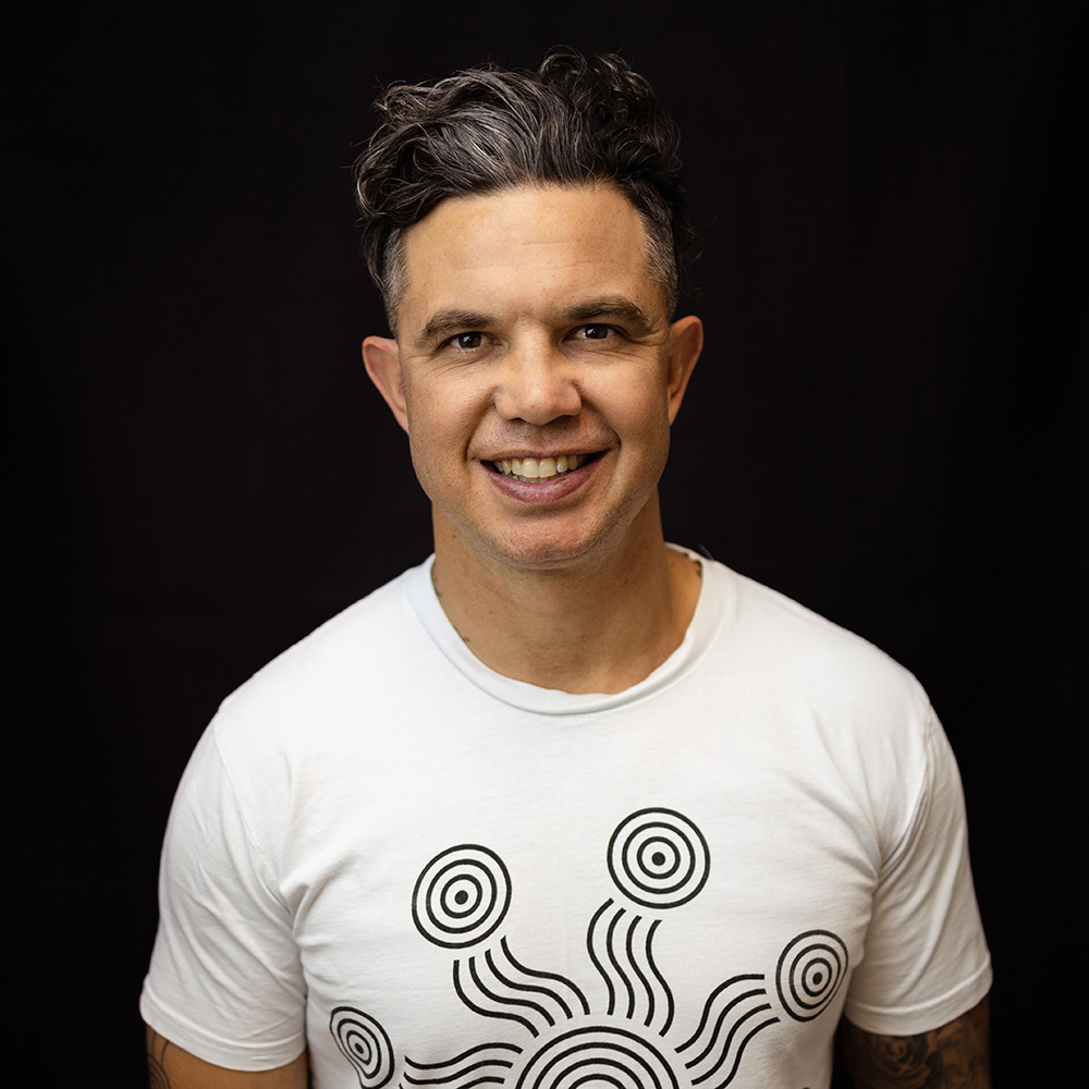 Portrait of Joe Williams against a studio background.