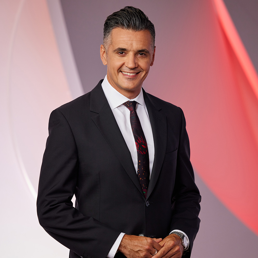 Portrait of Ricardo Goncalves in formal business attire.