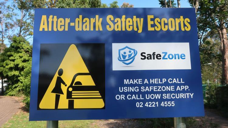 After dark security escort sign