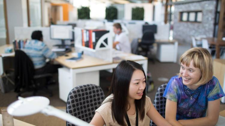 Two females, workplace