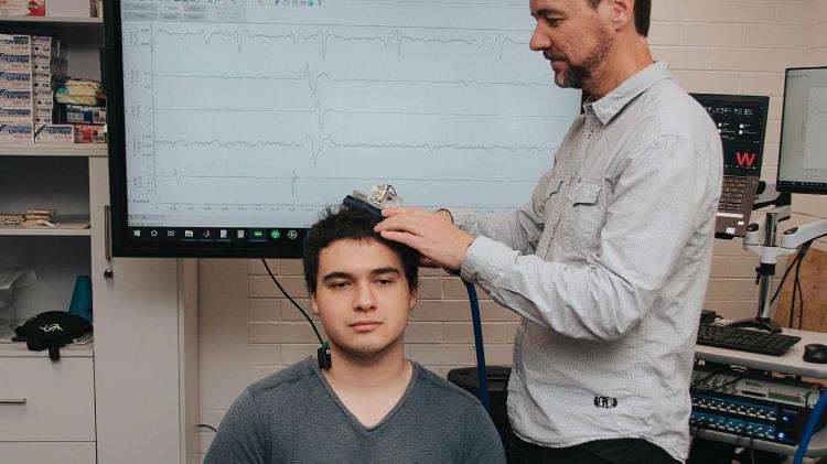 Man receiving brainstem stimulation