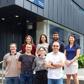 Tolun Group members standing out the front of the Molecular Horizons Building