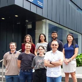 Tolun Group members standing out the front of the Molecular Horizons Building