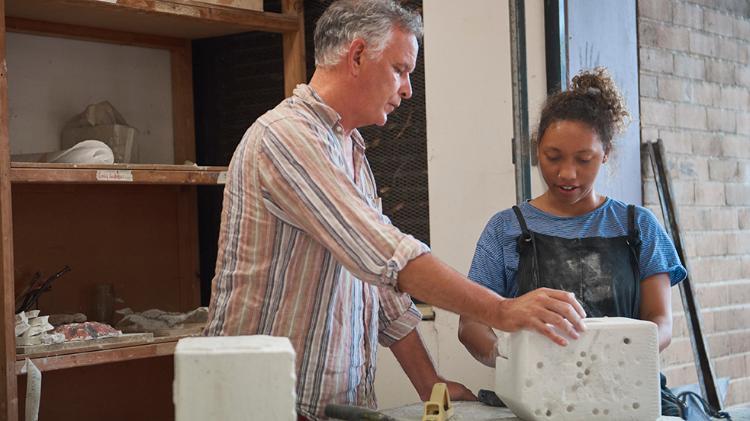 Teacher and student in Sculpture studio