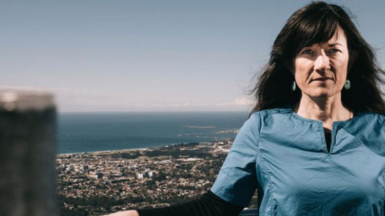 Pauline McGuirk standing with Wollongong in background