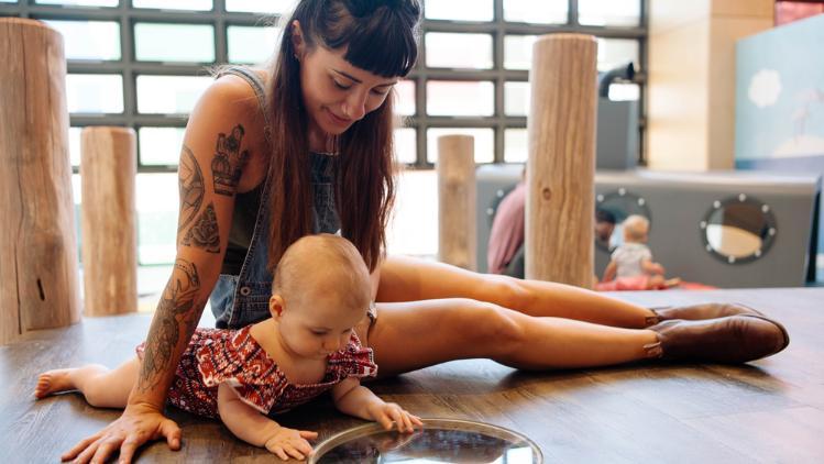 mother and daughter playing