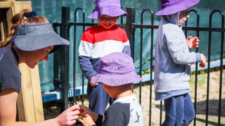 An educator from Kids Uni engaging with a child