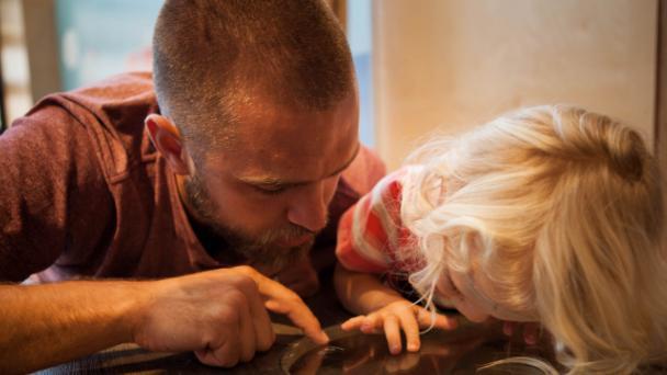 dad and child playing