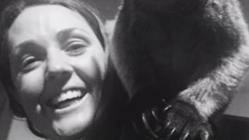 Erin Lake with the foot of a wallaby on her shoulder