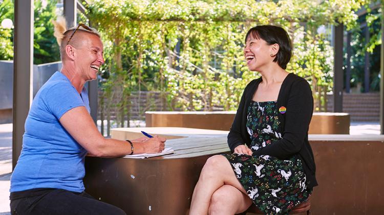 Staff student consultation outdoors