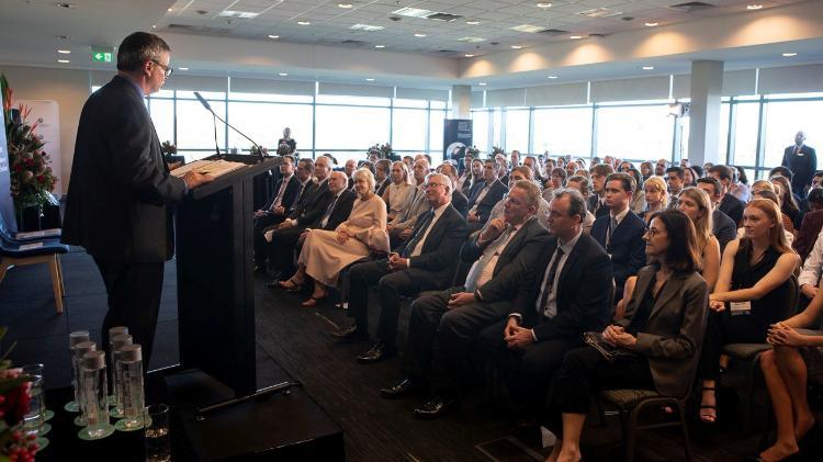 Attendees sitting at event