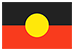 The Aboriginal flag featuring a horizontal black stripe on top, a red stripe on the bottom, and a central yellow circle symbolizing the sun.