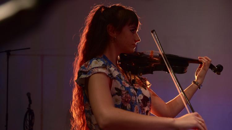 Music student playing violin