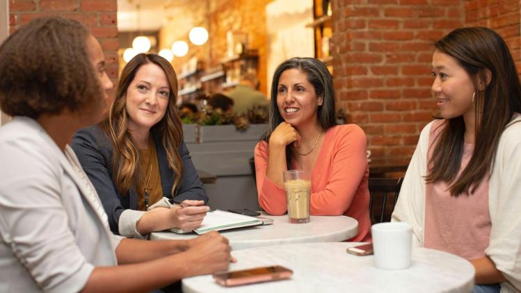 Group of people gathered around a table