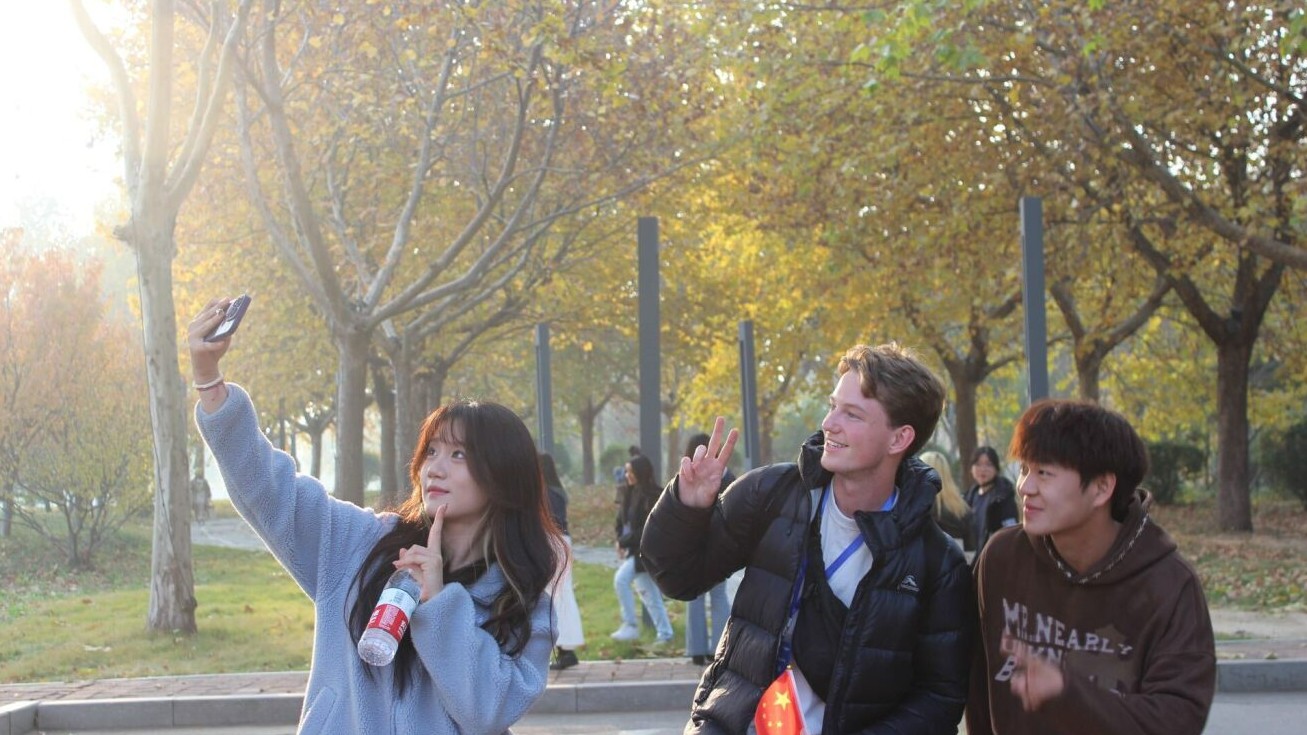 Three students taking a selfie photo
