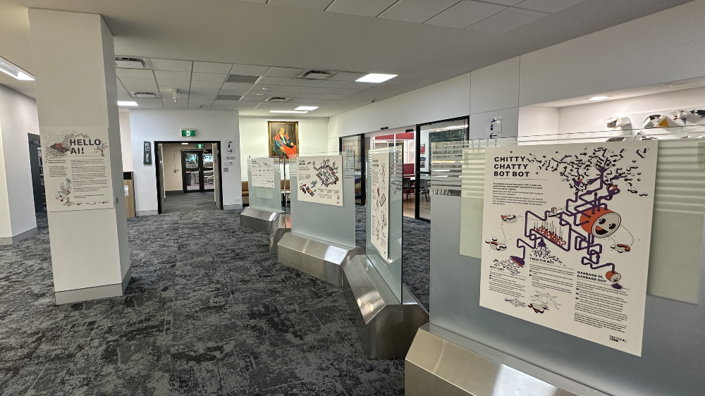 Large posters with AI information displayed inside the ������Ƶapp Campus Library