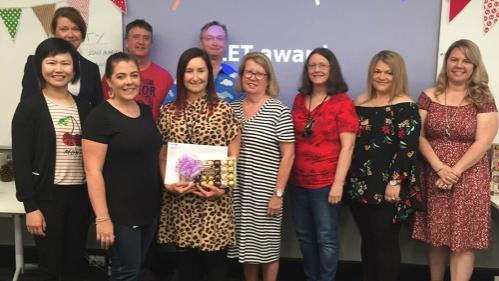 Photo of Library staff members receiving the LET Award