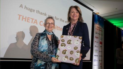 Margie Jantti, Director Library Services, receiving a gift from the THETA Conference Committee