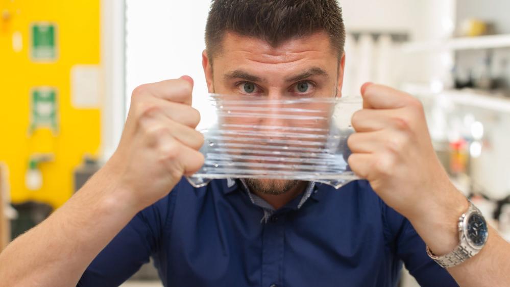 Researcher Robert Gorkin III with the next generation condom.