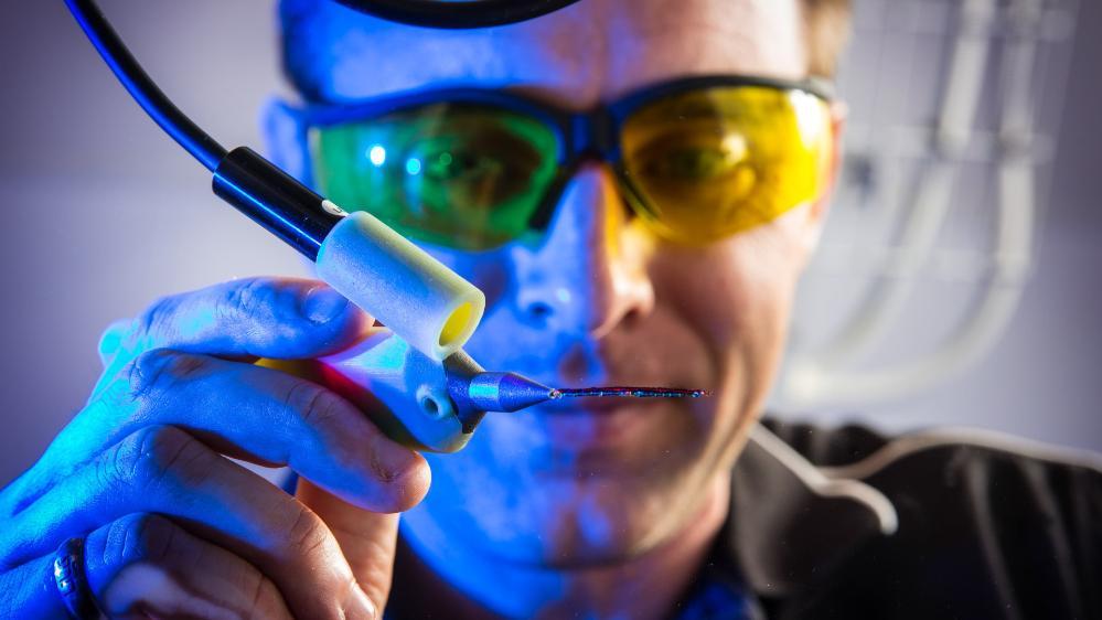 An image of Stephen Beirne with the Bioprint pen. Photo: Paul Jones
