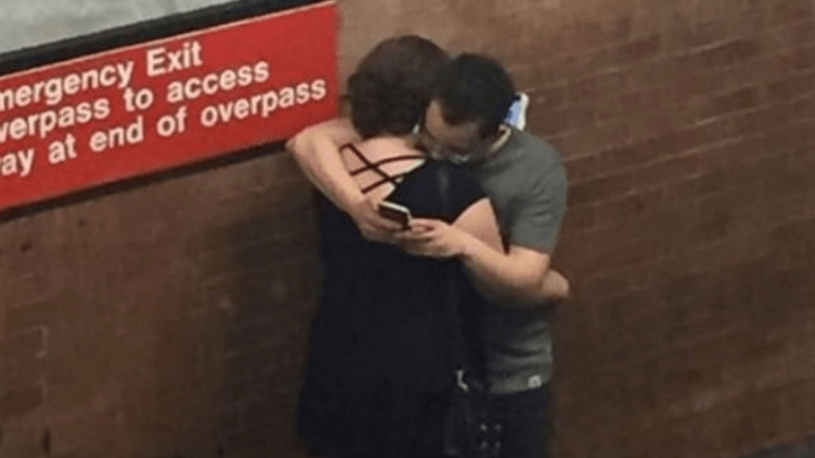 Couple on their phones